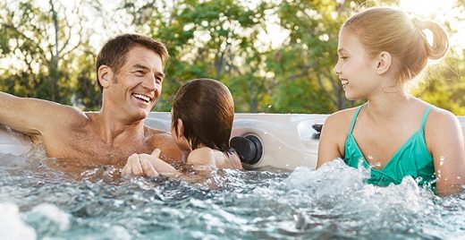 Father With HIs Two Kids in A 4 person Hot tub