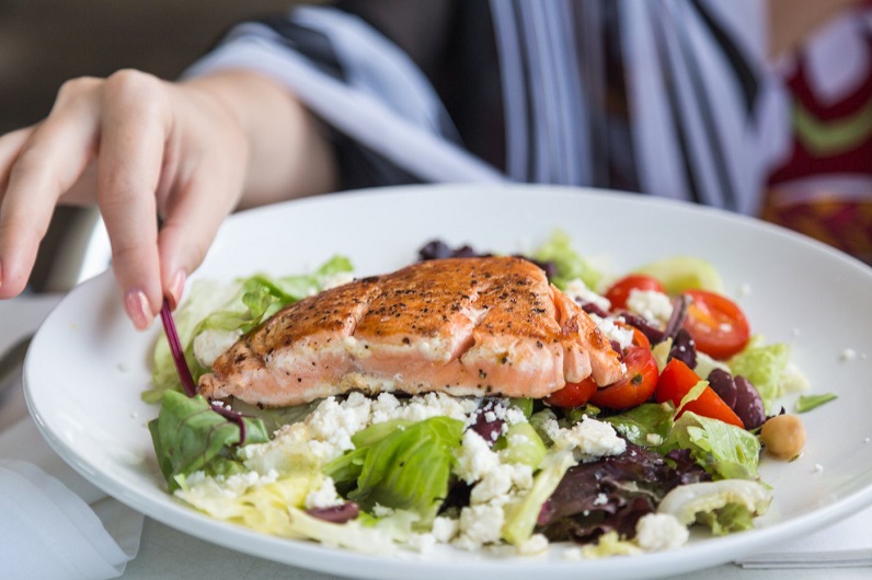 plate filled with vegetable and fish healthy diet