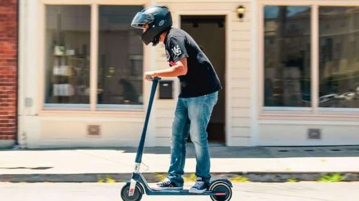 man driving pro scooter