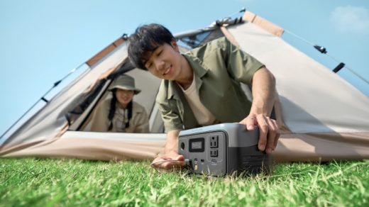woman and man camping with camping batteries